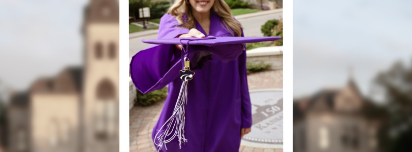 Woman wearing Purple K-State Graduation Regalia