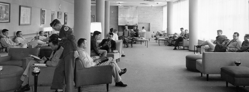 1960s students seated in open lounge area