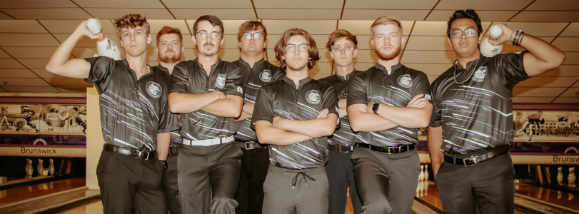 Mens Bowling Team standing on lanes